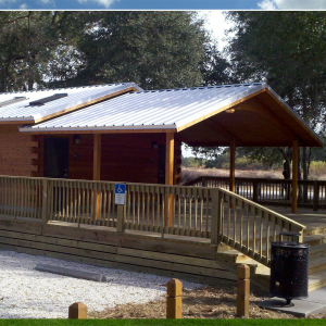 Image of an outdoor shelter built over a wooden decked entrance